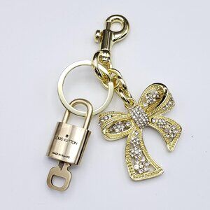 Authentic Louis Vuitton Lock & Key with Unbranded Ribbon Charm, Keychain
